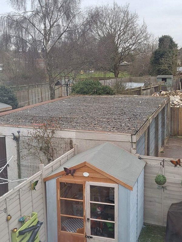 Asbestos roof removal