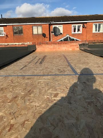 Asbestos garage roof removal